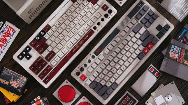 Keyboards are arranged next to old NES and Famicom games.